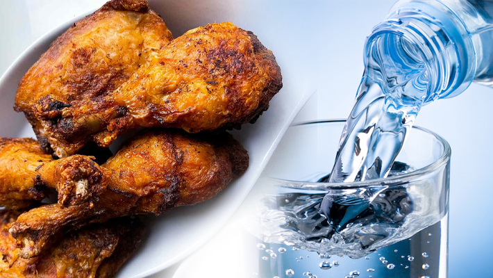 Pieces of fried chicken and bottled water