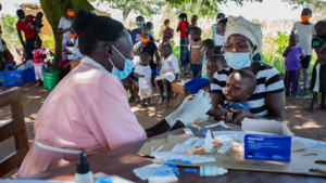 Children in Africa being vaccinated.