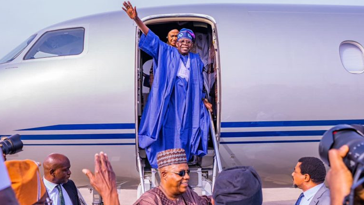 Tinubu disembarking from plane