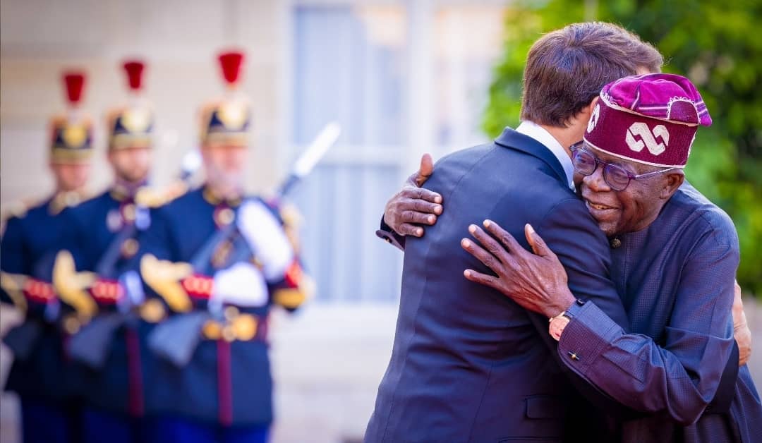 France President Emmanuel Macron in warm embrace with Nigerian President Bola Tinubu in France (Credit: Bola Tinubu)