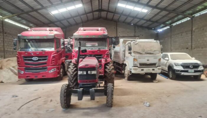Duty trucks, tractors recovered from secret warehouse