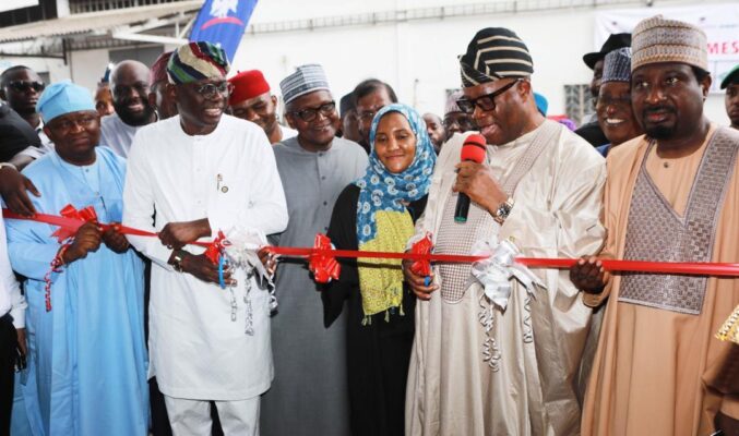 Chairman of the Senate Committee on Appropriation, Olamilekan Adeola; Lagos State Governor, Babajide Sanwo-Olu; President/CE, Dangote Industries Limited, Aliko Dangote; Group Executive Director, Commercial Operations, Dangote Industries Limited, Fatima Aliko Dangote; Senate President, Senator Godswill Akpabio, cutting the tape; Deputy Senate President, Senator Barau Jibrin, during the visit of National Assembly leadership to Commission the Completely Knocked Down (CKD) Plant of Dangote Sinotruk West Africa Limited, Ikeja
