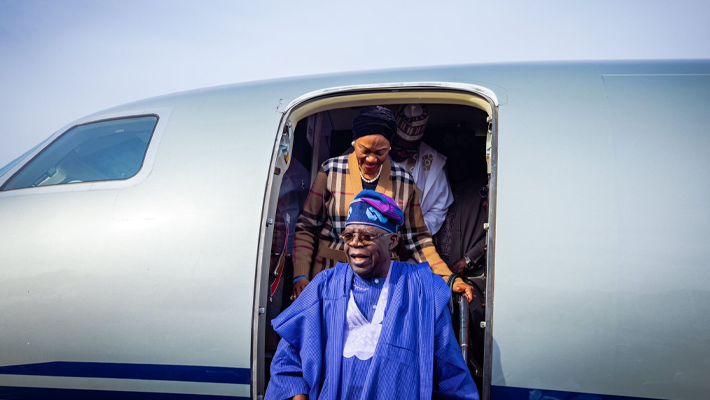 President Bola Tinubu and Remi Tinubu disembarking from plane