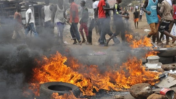 Youths burning tyres