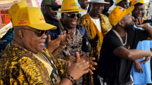 Davido on stage with Adeleke