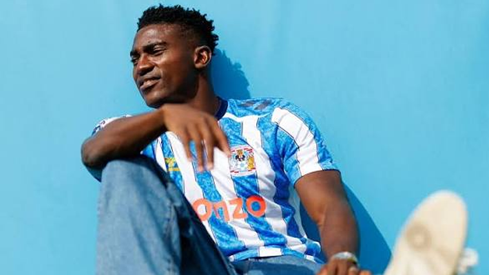 Awoniyi in Conventy City shirt 