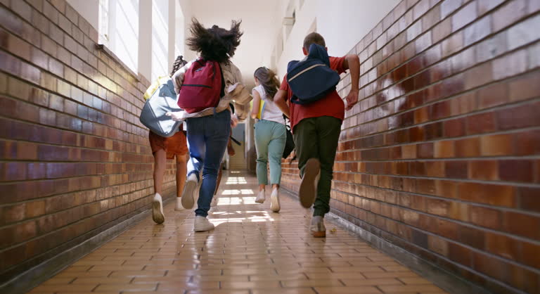 Schoolchildren running for safety