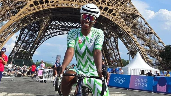 Ese Ukpeseraye on the borrowed bike