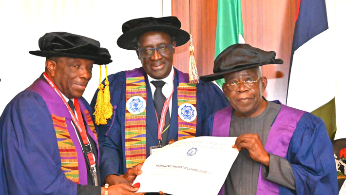 Tinubu in gown