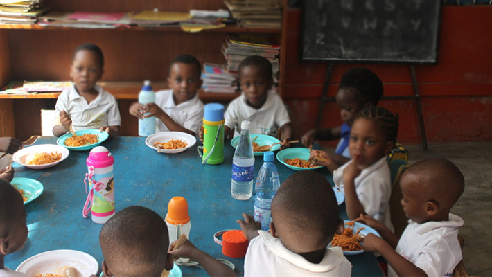 Kids eating in open