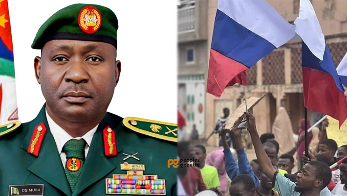 General Christopher Musa and protesters with Russian flags