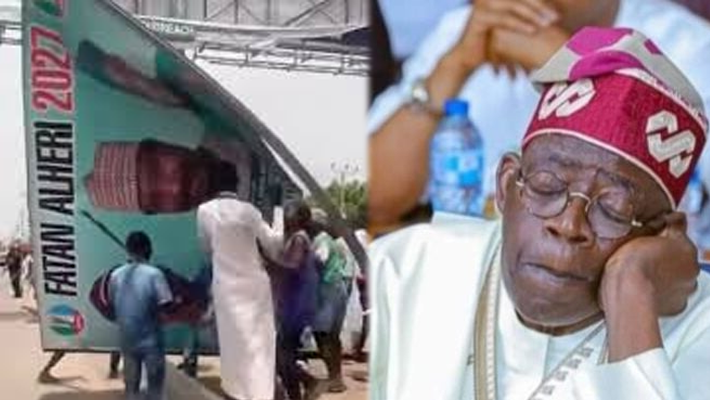 Youths tearing down posters and Sleeping Tinubu