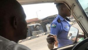 Police caught extorting motorist