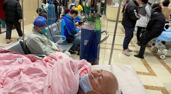 COVID-19 patient in China (Credit: Reuters)