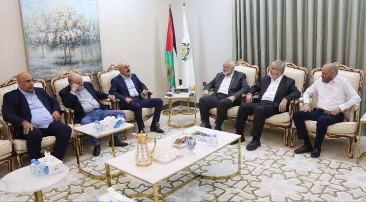 Qatar officials (Credit: The Israel Times)
