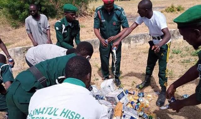 Photo of hisbah officers destroying drinks used to illustrate this story