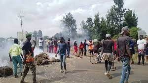 Youths blocking highway