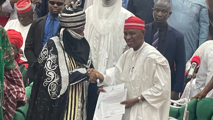 Governor Yusuf presenting letter to Muhammadu Sanusi