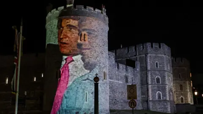 Projected images of Trump, Epstein on castle