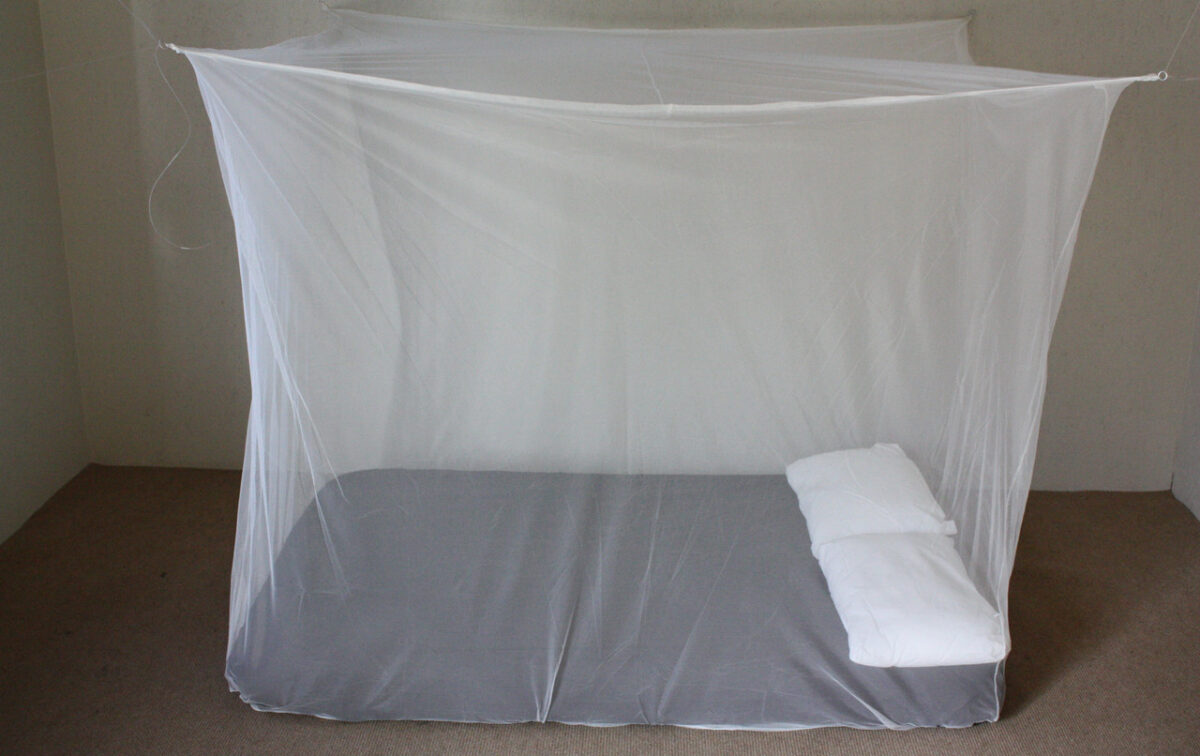 Treated mosquito nets
