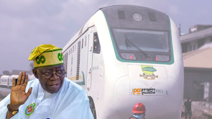 Abuja train and Tinubu waving