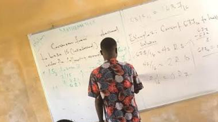 Teacher teaching maths