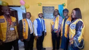 Some members of Yaba Lions Club District 404A3 at inauguration of refurbished toilets at Yabatech Staff Primary School, Lagos, on Thursday