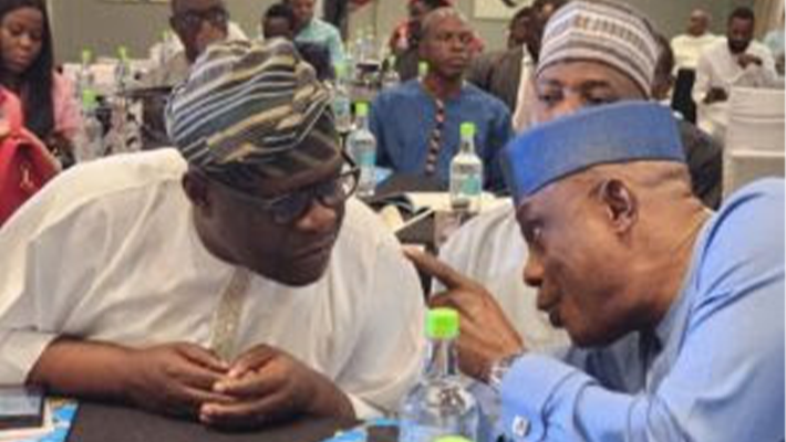 L-R: The Executive Director and Chief Executive Officer of National Film and Video Censors Board, Dr Shaibu Husseini, having a conversation with a former Deputy Comptroller-General of Nigeria Immigration Service, Dr Emmanuel Ifeadi, at the Association of Nigerian Journalists and Writers of Tourism (ANJET) Conference and Awards 2026 on Friday in Lagos