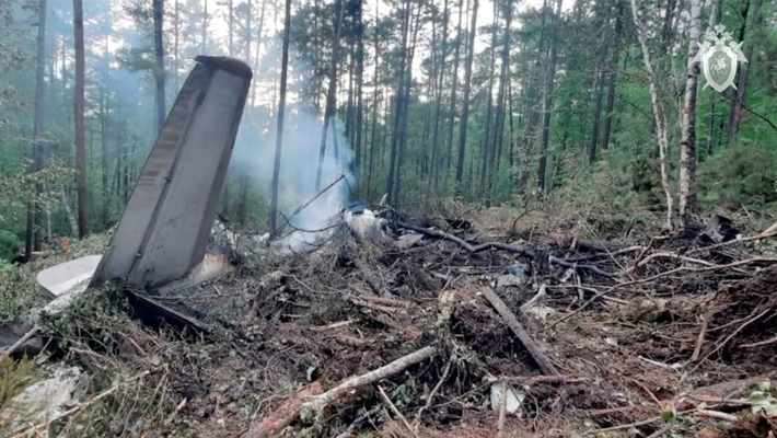 Debris of an Angara Airlines An-24 passenger aircraft at the crash site near Tynda in the Amur Region, Russia