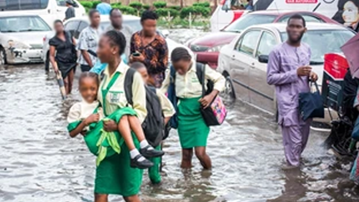 Schoolchildren in rain